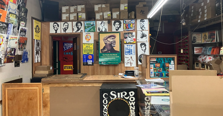 interior of a record shop covered with posters